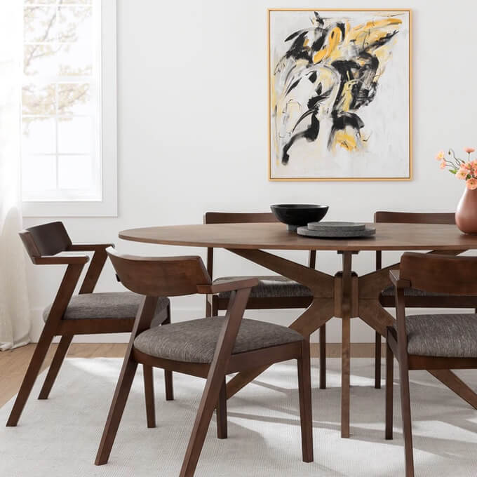 Article Dining room collection brown stained table and chairs set with white wall interior and painting